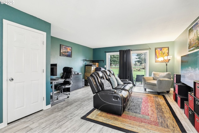 living room with light hardwood / wood-style floors