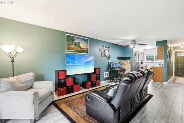 1763 NE 19th St, Gresham, OR 97030 - living area with light wood-type flooring and a ceiling fan