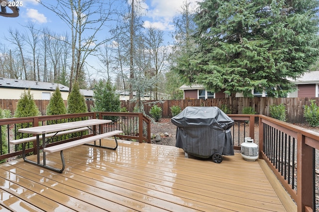 wooden deck with area for grilling