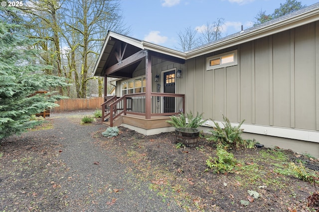 view of property exterior featuring a porch