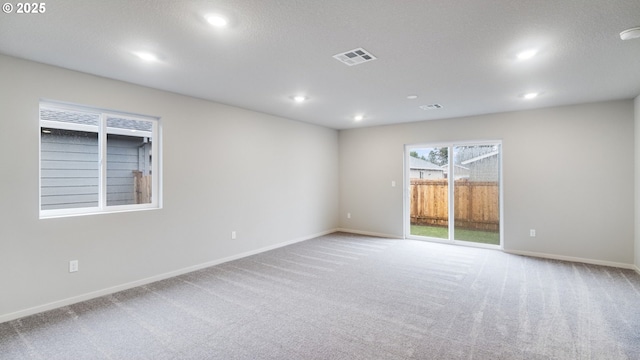 empty room with carpet flooring