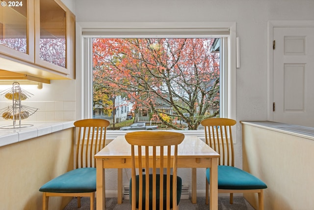 dining area with carpet