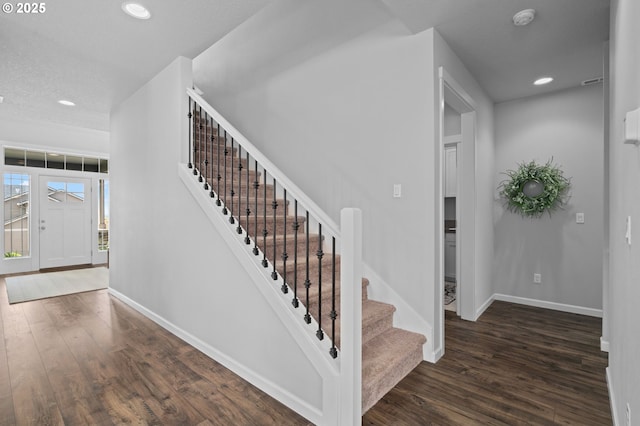 1010 NW 1st St, Dundee, OR 97115 - stairway featuring recessed lighting, wood finished floors, and baseboards