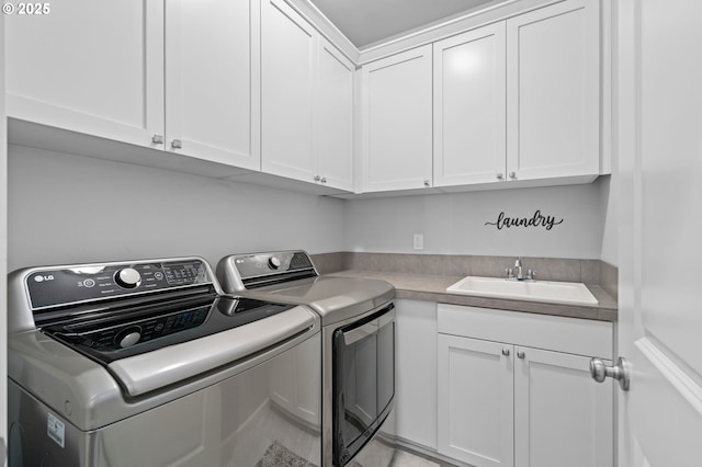 1010 NW 1st St, Dundee, OR 97115 - laundry room with cabinet space, a sink, and separate washer and dryer