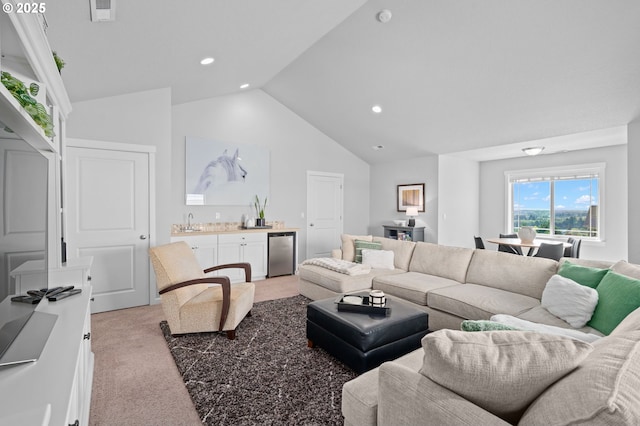 1010 NW 1st St, Dundee, OR 97115 - living room with recessed lighting, vaulted ceiling, and light colored carpet