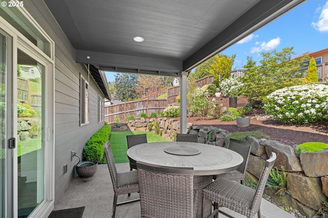 1010 NW 1st St, Dundee, OR 97115 - view of patio featuring a fenced backyard and outdoor dining area