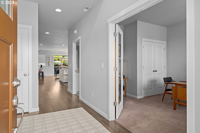 1010 NW 1st St, Dundee, OR 97115 - foyer with baseboards, wood finished floors, visible vents, and recessed lighting