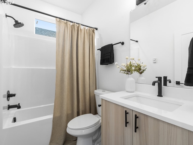 full bathroom featuring vanity, toilet, and shower / bath combo with shower curtain