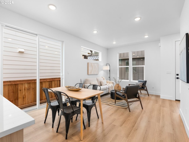 dining area with light hardwood / wood-style flooring