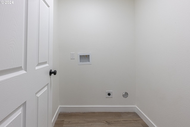 clothes washing area with electric dryer hookup, wood-type flooring, and washer hookup