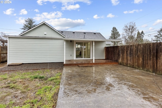 back of property featuring a patio area