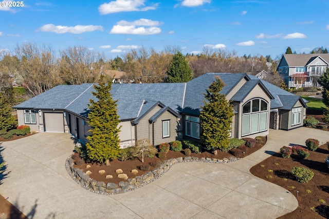 ranch-style home featuring a garage