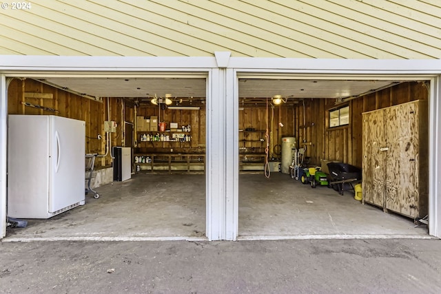 garage with white refrigerator