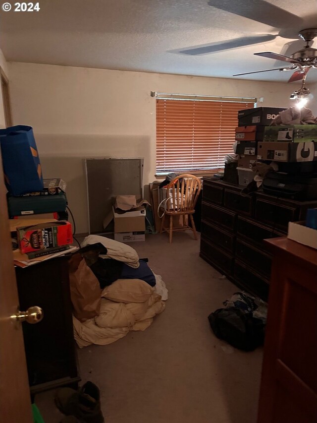 carpeted bedroom with a ceiling fan
