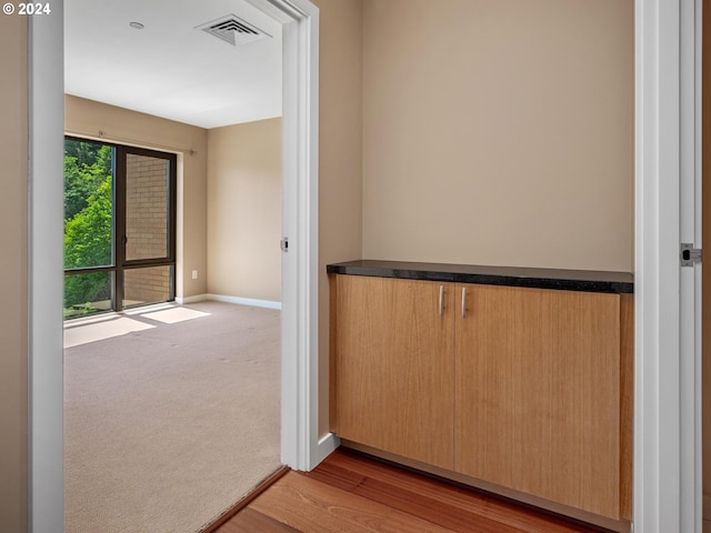 entryway with light hardwood / wood-style flooring