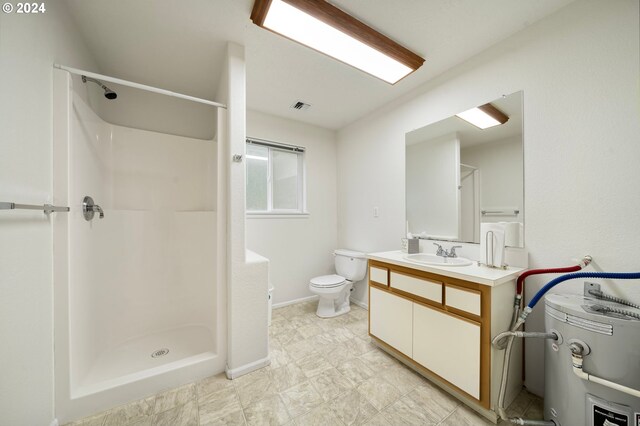 bathroom with vanity, visible vents, baseboards, a shower, and toilet