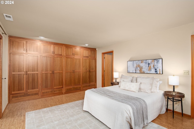 bedroom featuring light hardwood / wood-style floors