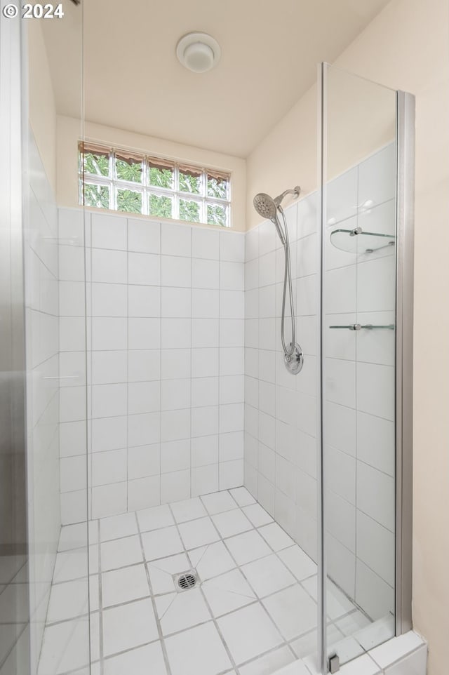 bathroom featuring an enclosed shower