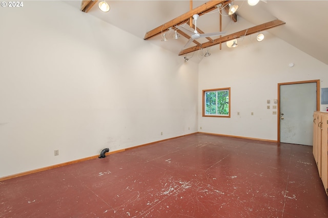 interior space featuring beam ceiling and high vaulted ceiling