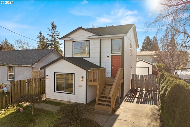 view of front of property featuring a wooden deck