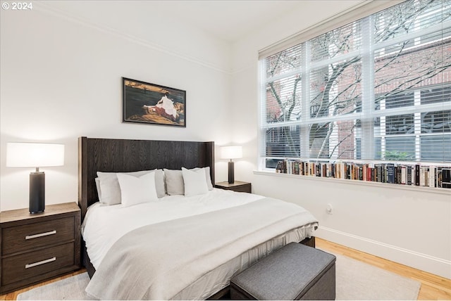 bedroom featuring light wood-type flooring