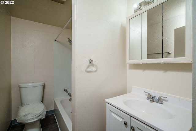 full bathroom featuring toilet, shower / bathtub combination, and vanity with extensive cabinet space