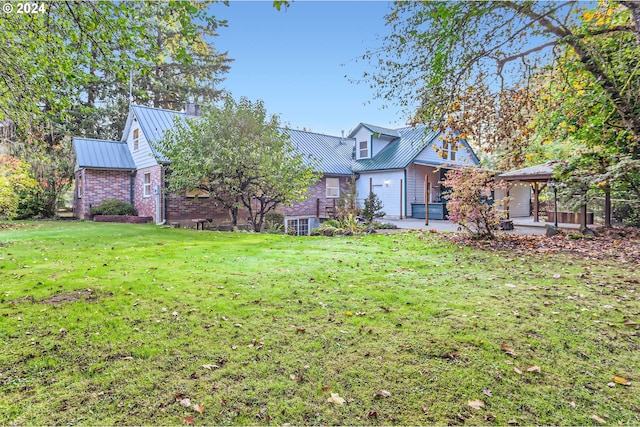 view of front of home with a front yard