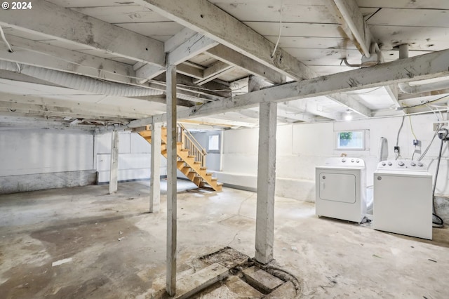 basement with washing machine and clothes dryer