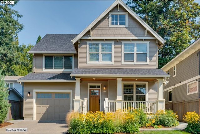 craftsman-style house with a porch, a garage, fence, a shingled roof, and concrete driveway