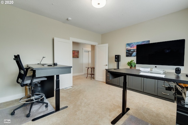 office area with light colored carpet