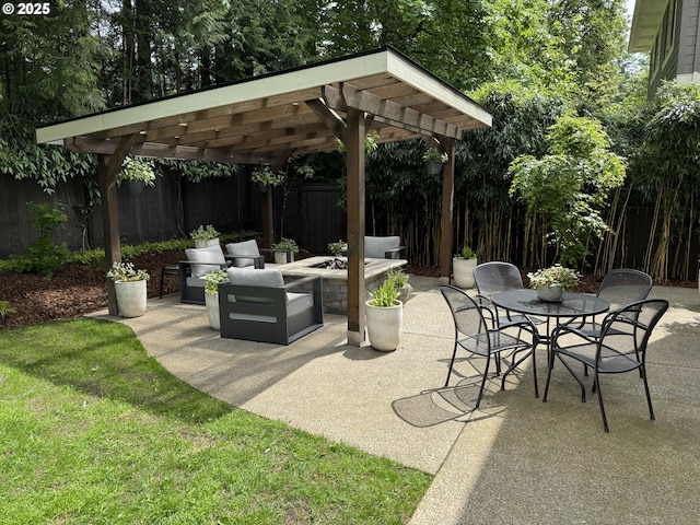 view of patio with an outdoor fire pit and a pergola