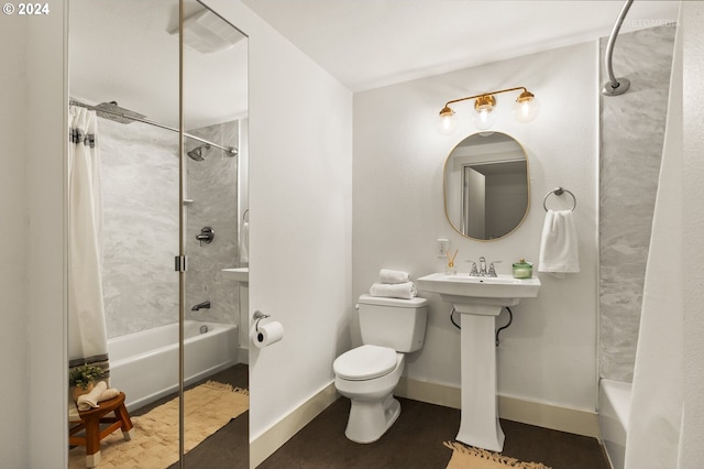 bathroom with shower / bath combo with shower curtain and toilet