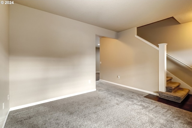 unfurnished room featuring carpet