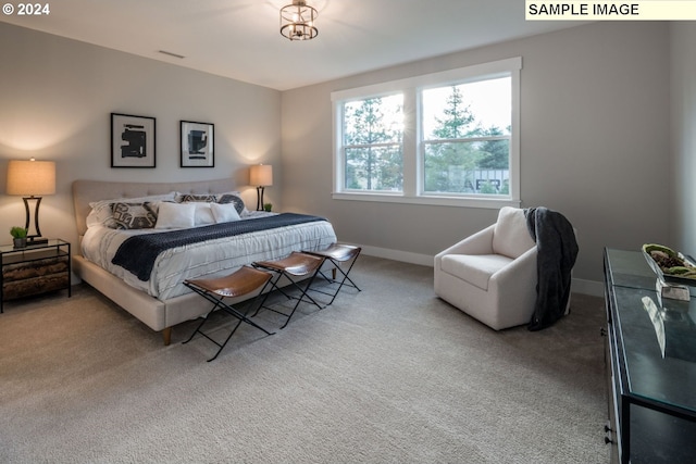 bedroom with light carpet