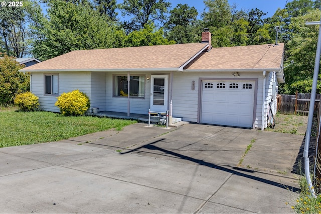 3973 Carnes Rd, Roseburg, OR 97471 - ranch-style home with a garage, a chimney, concrete driveway, and a shingled roof
