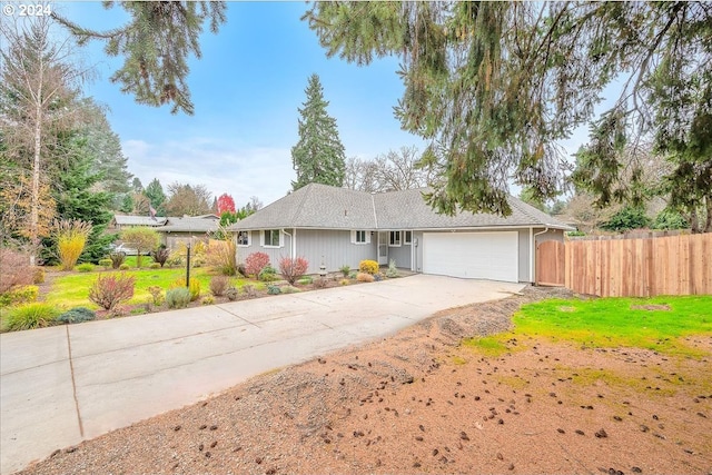 ranch-style home with a garage