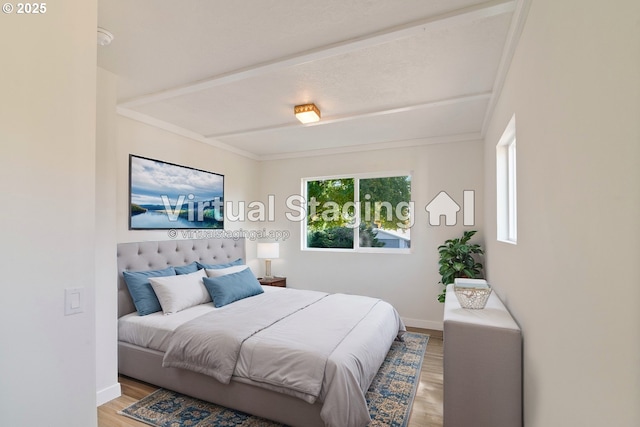 7331 SW Oak St, Tigard, OR 97223 - bedroom featuring light wood-type flooring and beamed ceiling