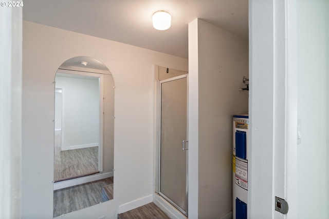7331 SW Oak St, Tigard, OR 97223 - hallway with wood finished floors and arched walkways