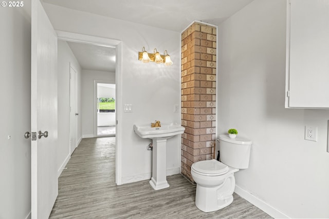 7331 SW Oak St, Tigard, OR 97223 - half bath featuring wood finished floors and toilet