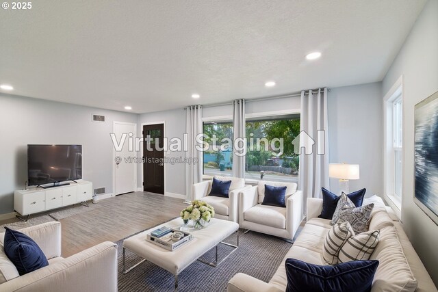 7331 SW Oak St, Tigard, OR 97223 - living room featuring recessed lighting and wood finished floors