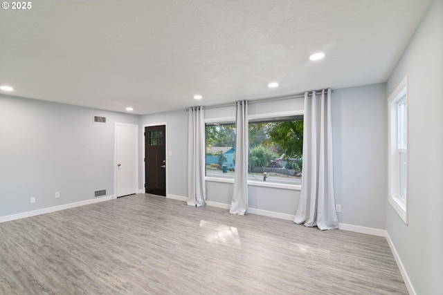7331 SW Oak St, Tigard, OR 97223 - empty room featuring recessed lighting and light wood-style flooring