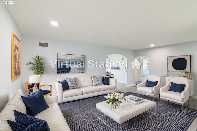 7331 SW Oak St, Tigard, OR 97223 - living room with arched walkways, recessed lighting, and wood finished floors