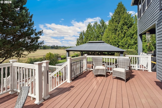 wooden deck with a gazebo