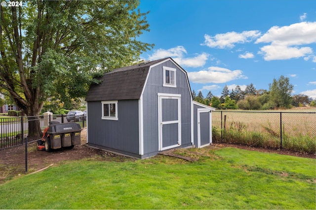 view of outdoor structure featuring a yard