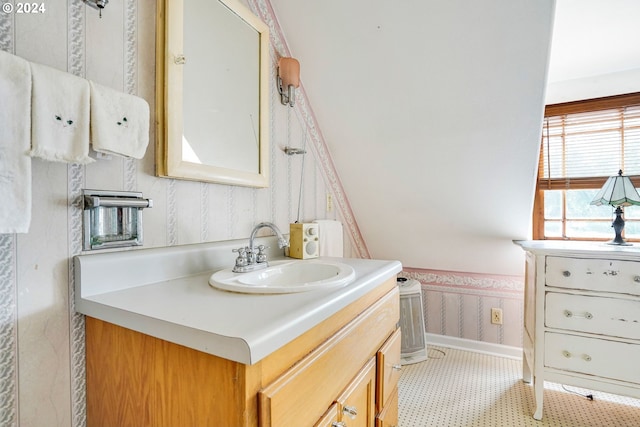 bathroom featuring tile patterned floors and vanity