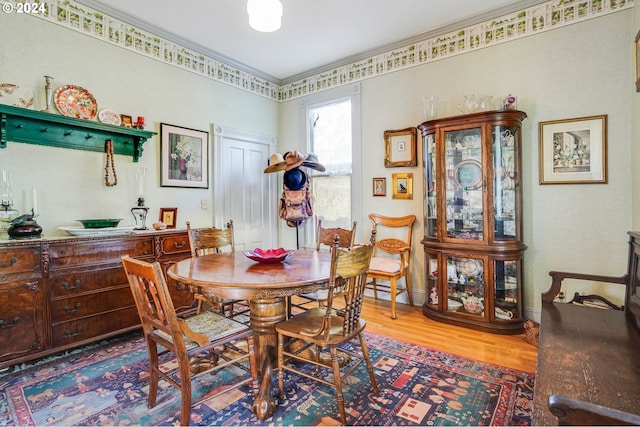 dining area featuring hardwood / wood-style flooring