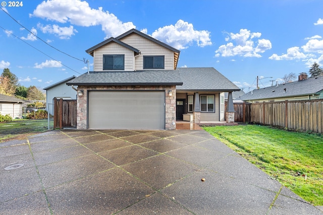 2721 La Darrah St, Eugene, OR 97404 - view of front of home with stone siding, a shingled roof, an attached garage, and a porch