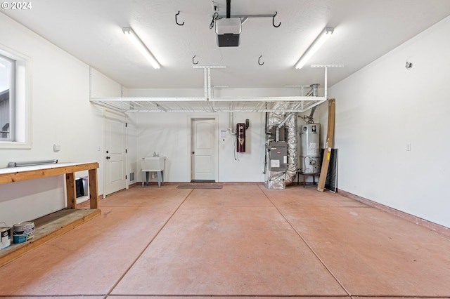 garage featuring heating unit, a garage door opener, and water heater