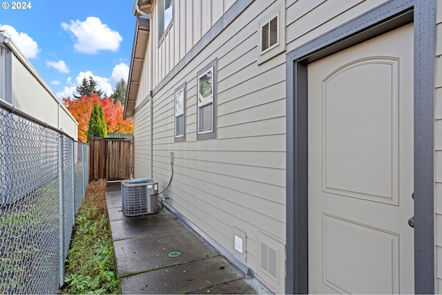 view of home's exterior with central AC unit