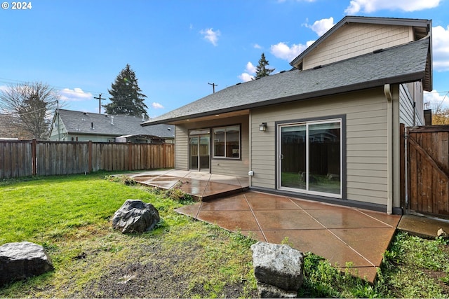 2721 La Darrah St, Eugene, OR 97404 - back of house with a patio area and roof with shingles